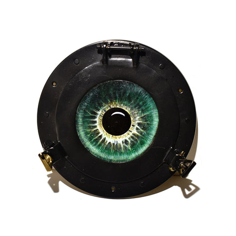 Image of Green Eye in Brass Portal by Justin D. Miller