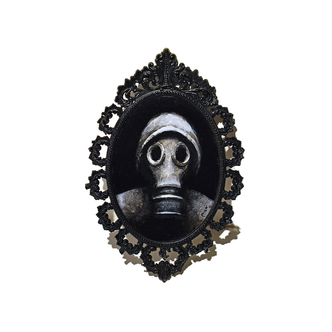 Image of Small Gas Mask by Justin D. Miller