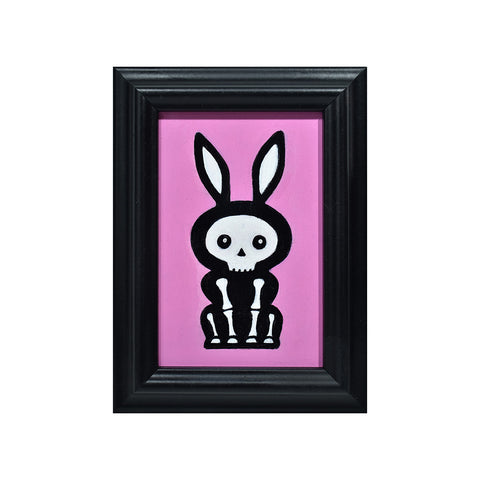 Image of Bunny Skeleton on Pink by Justin D. Miller