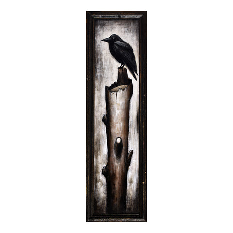 Image of Black Bird on Post by Justin D. Miller